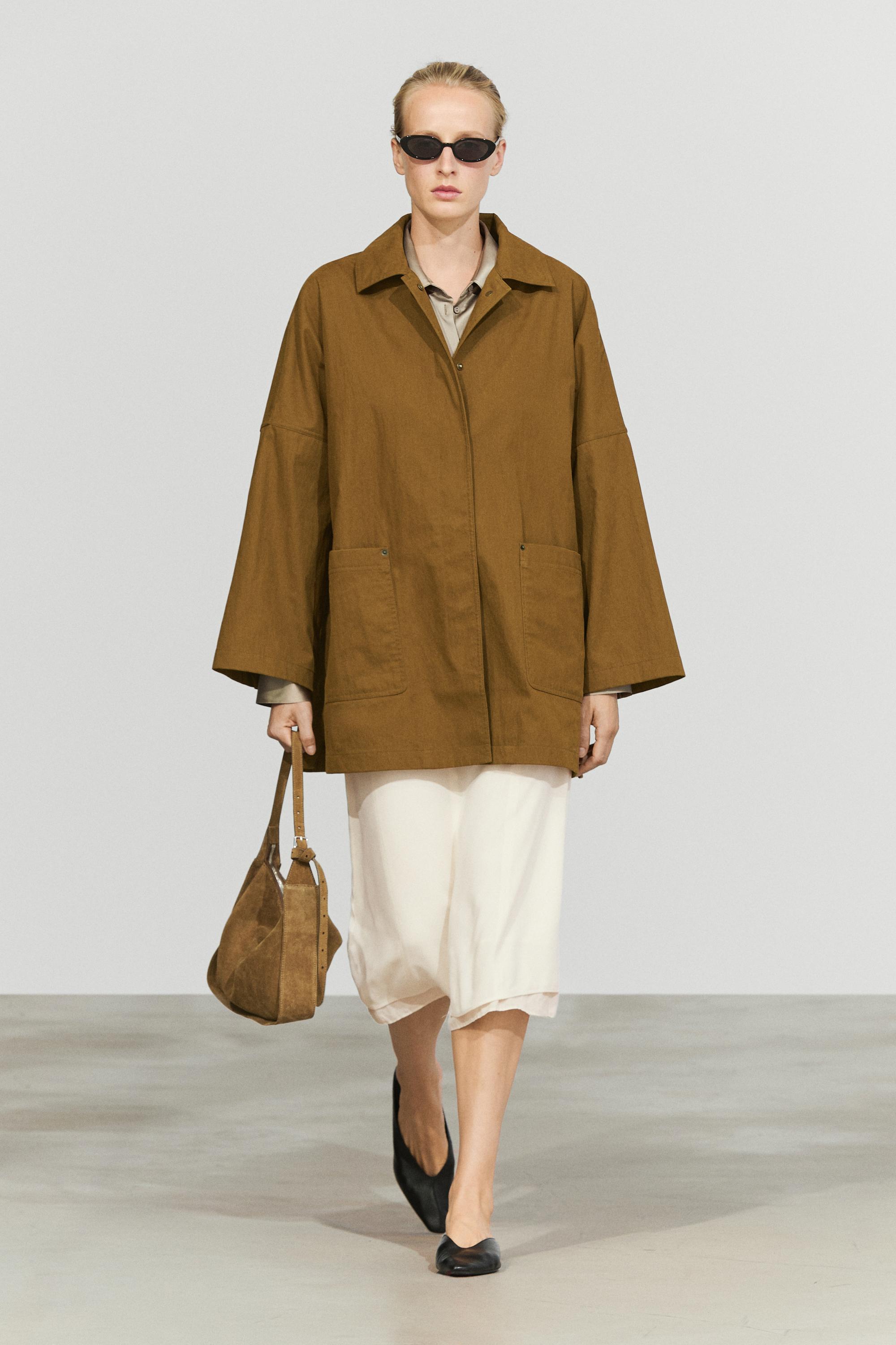 Button-tab cape jacket
